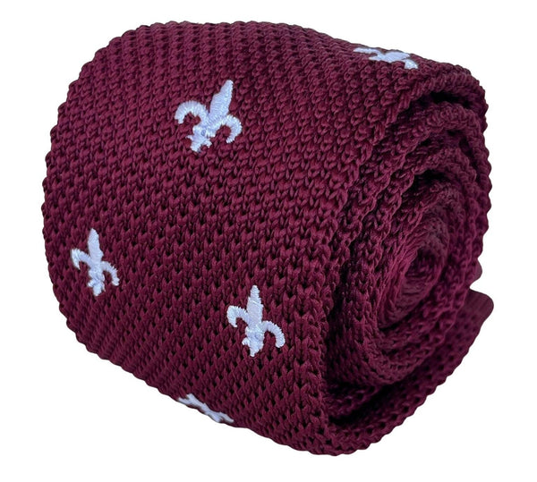 maroon knitted tie with white embroidered fleur de lis lys design